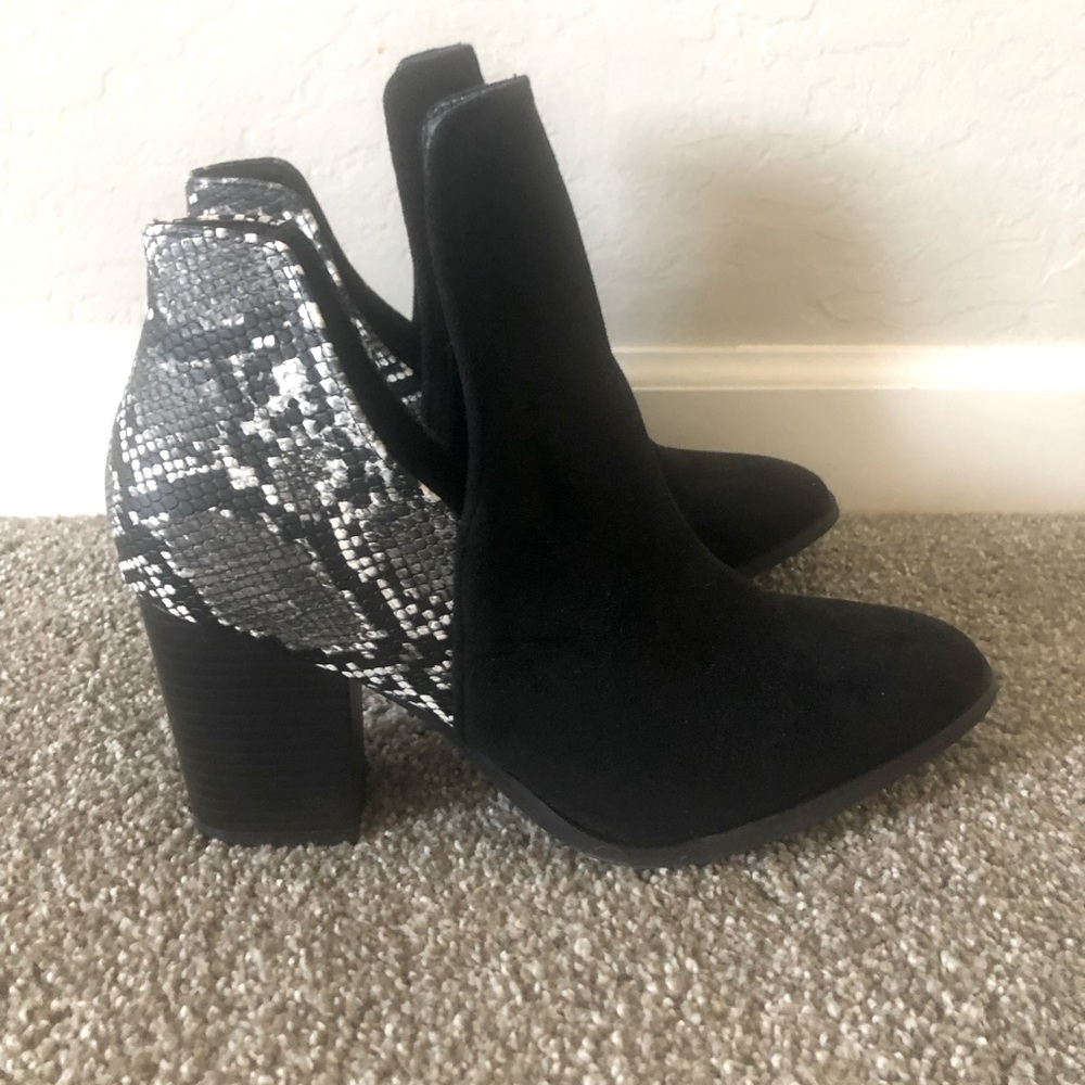 Super cute zebra booties! Only worn once.